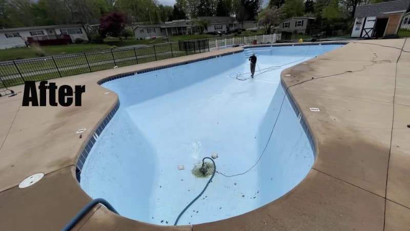 The same pool drained and washed back to its pale blue lining