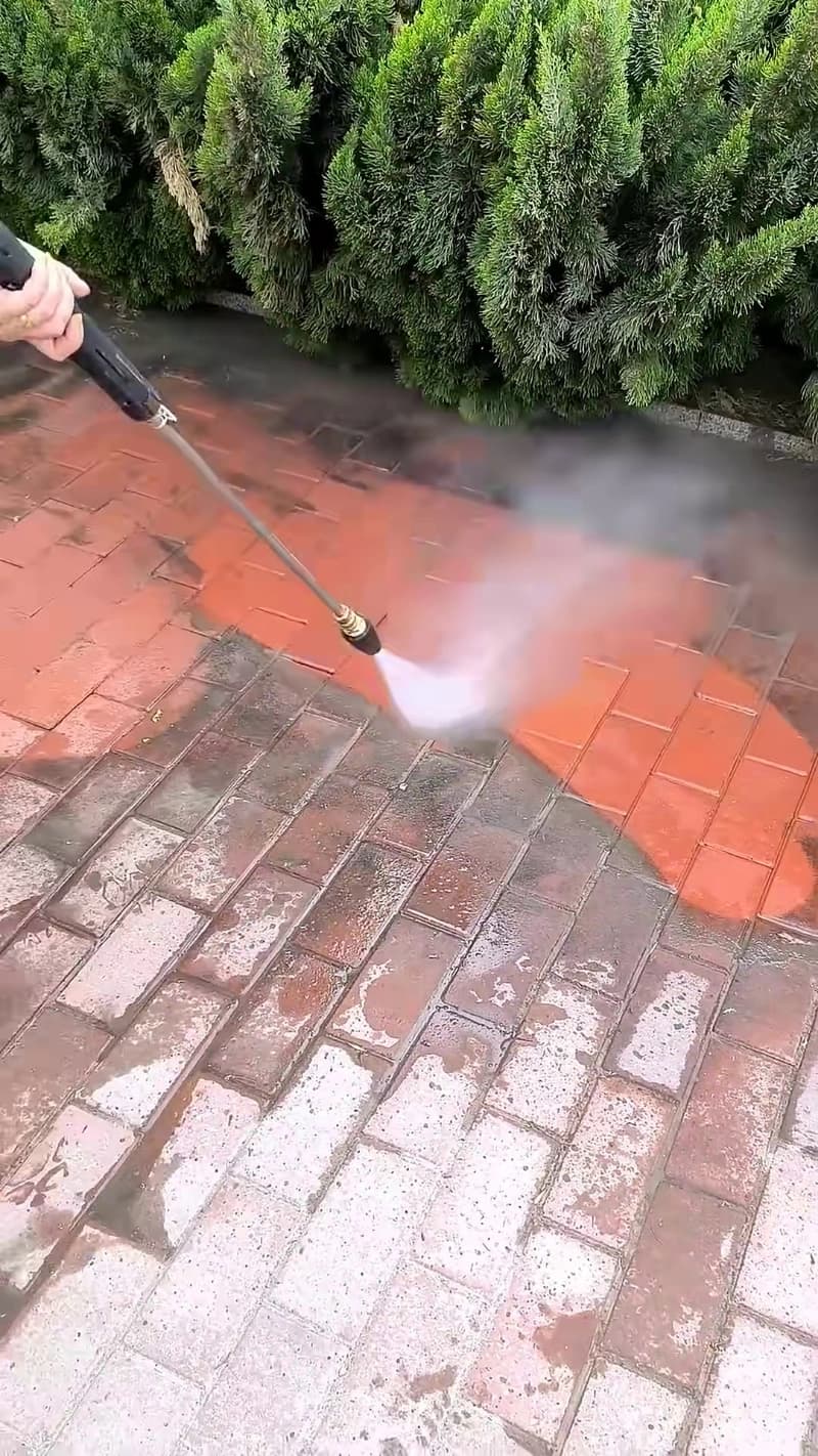 Clean paver patio beside a swimming pool in Jacksonville, Florida